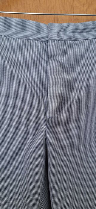 Calças modelo de fato em tecido pied de poule da Zara