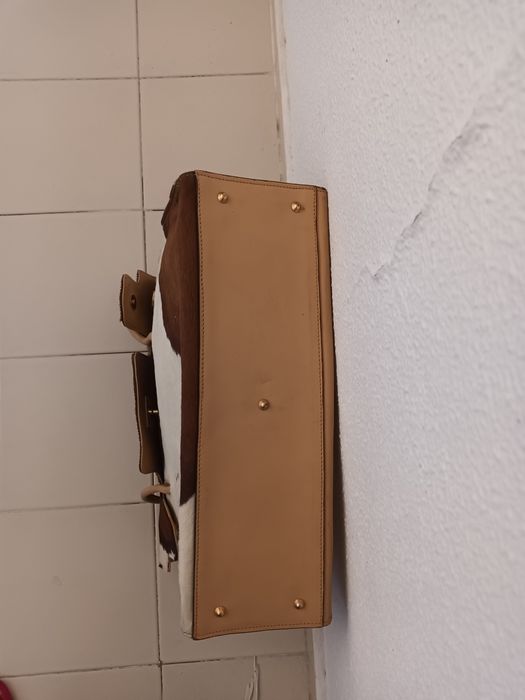 Mala em pele de vaca