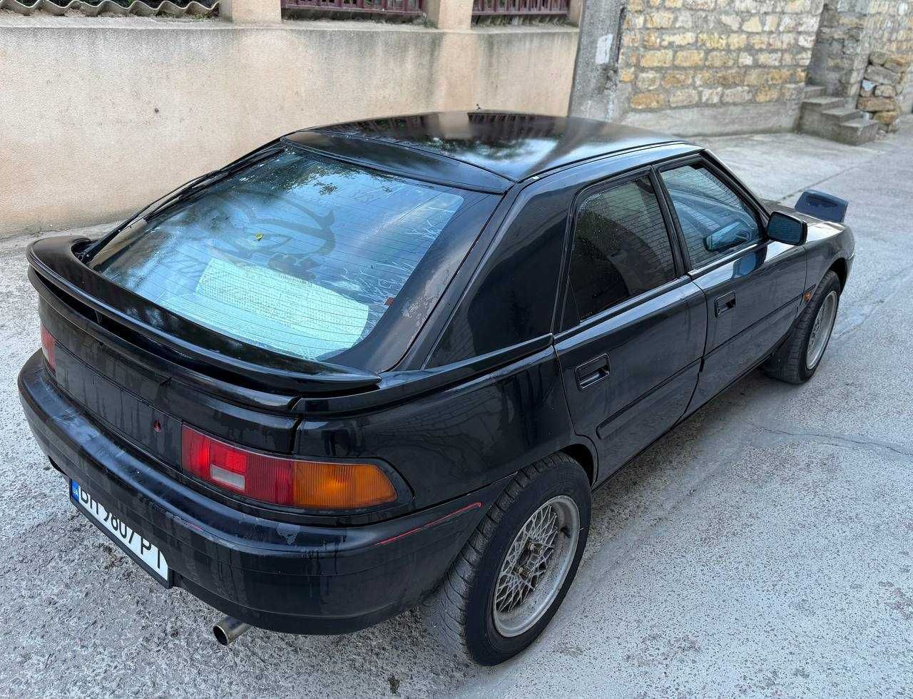 Mazda 323f слепая