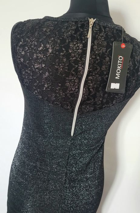 Nowa przepiękna dopasowana sukienka damska bez rękawów mieniąca sie