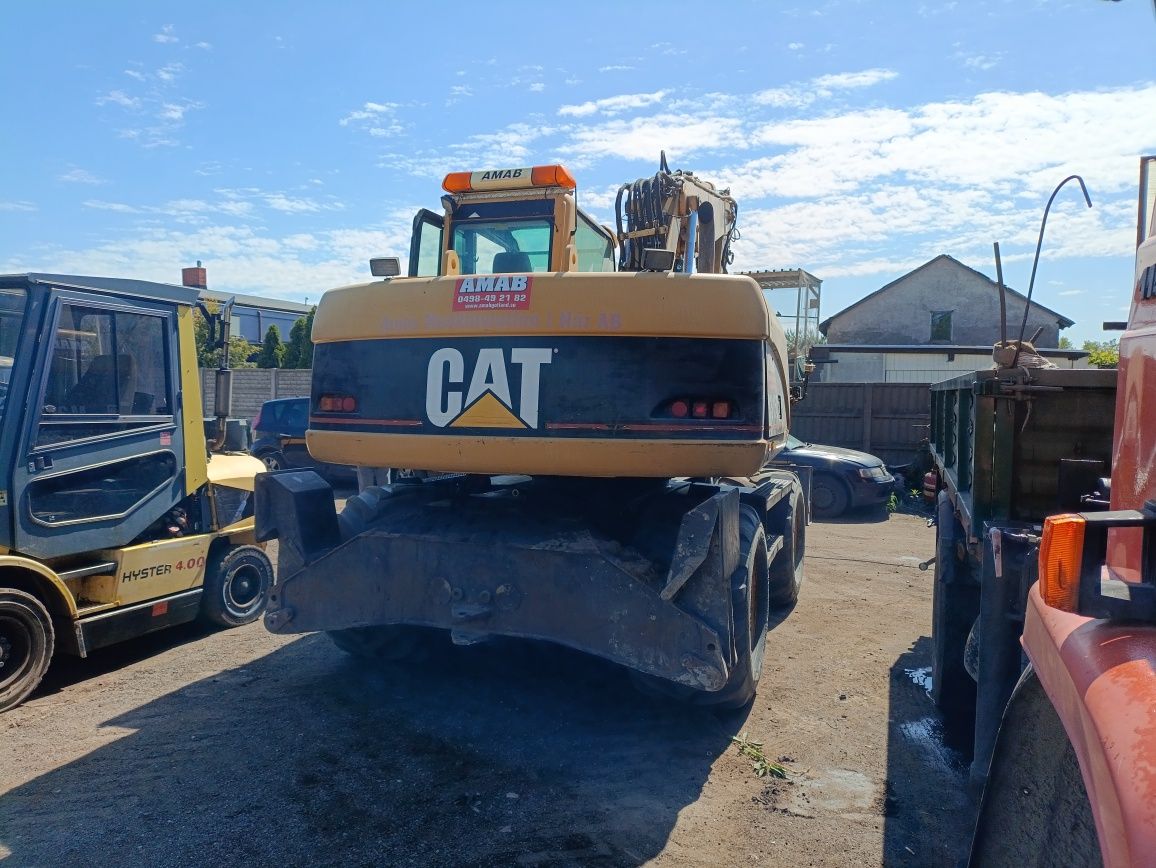 Koparka cat 315 rototilt głowica obrotowa powertilt  cat 313 liebherr