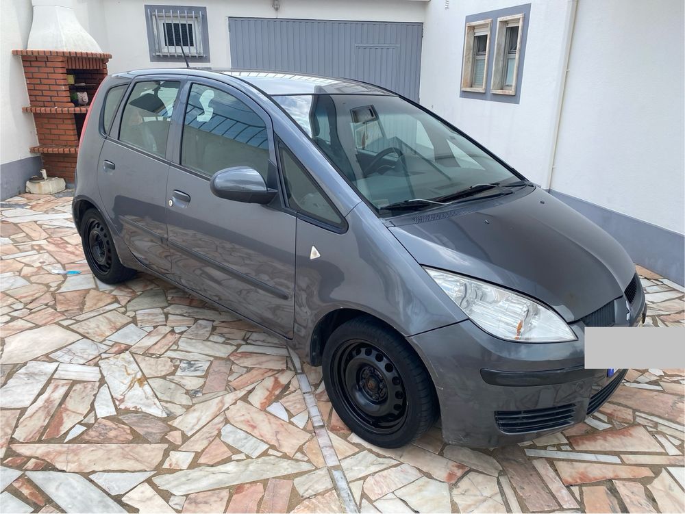 Mitsubishi colt 55cv , 209195 km.