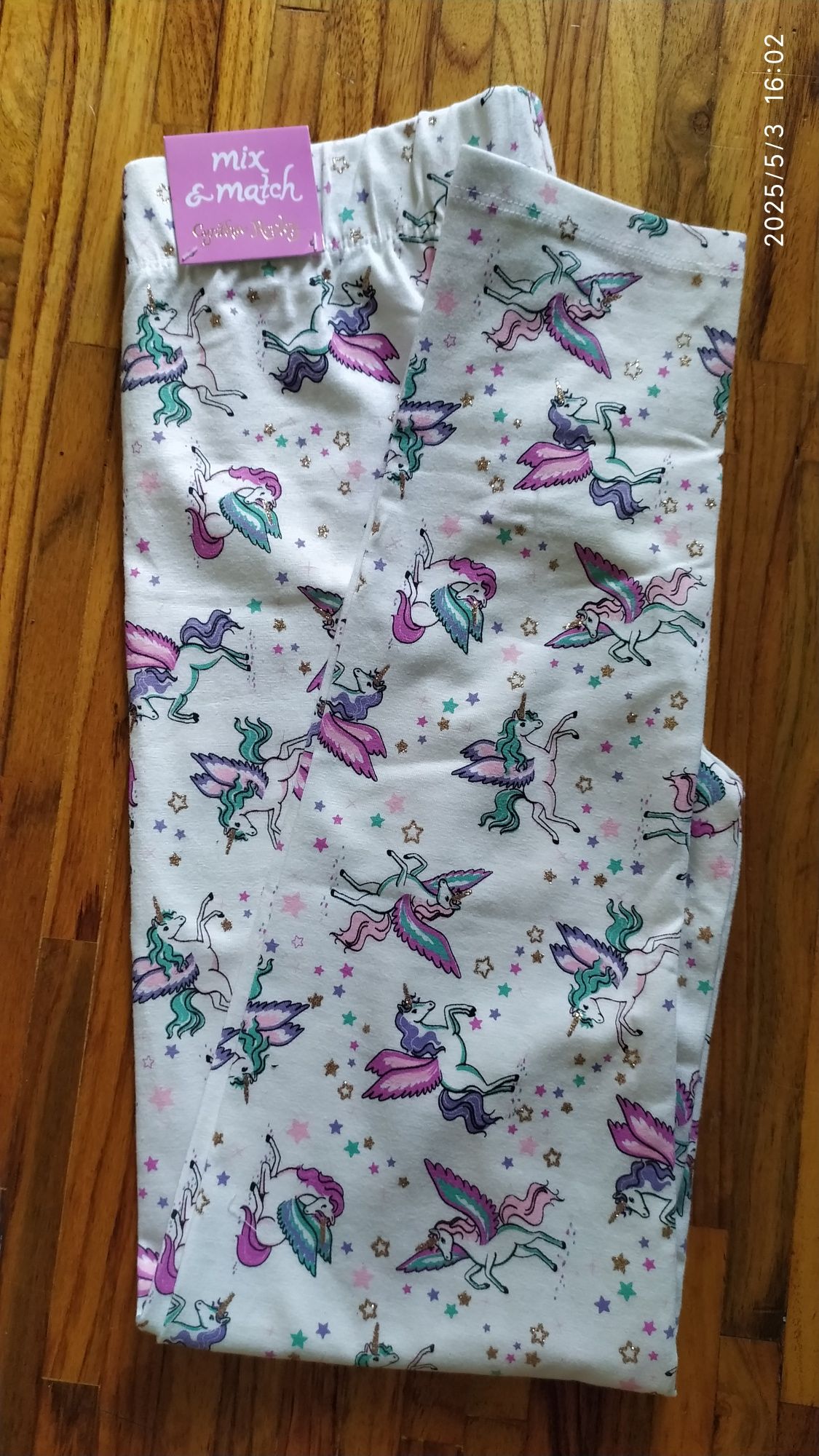 322. Prześliczne nowe legginsy na 10/11 lat