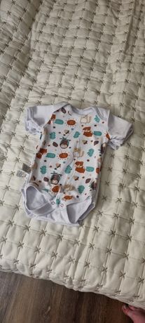 Одяг для новонароджених дівчат та хлопчиків