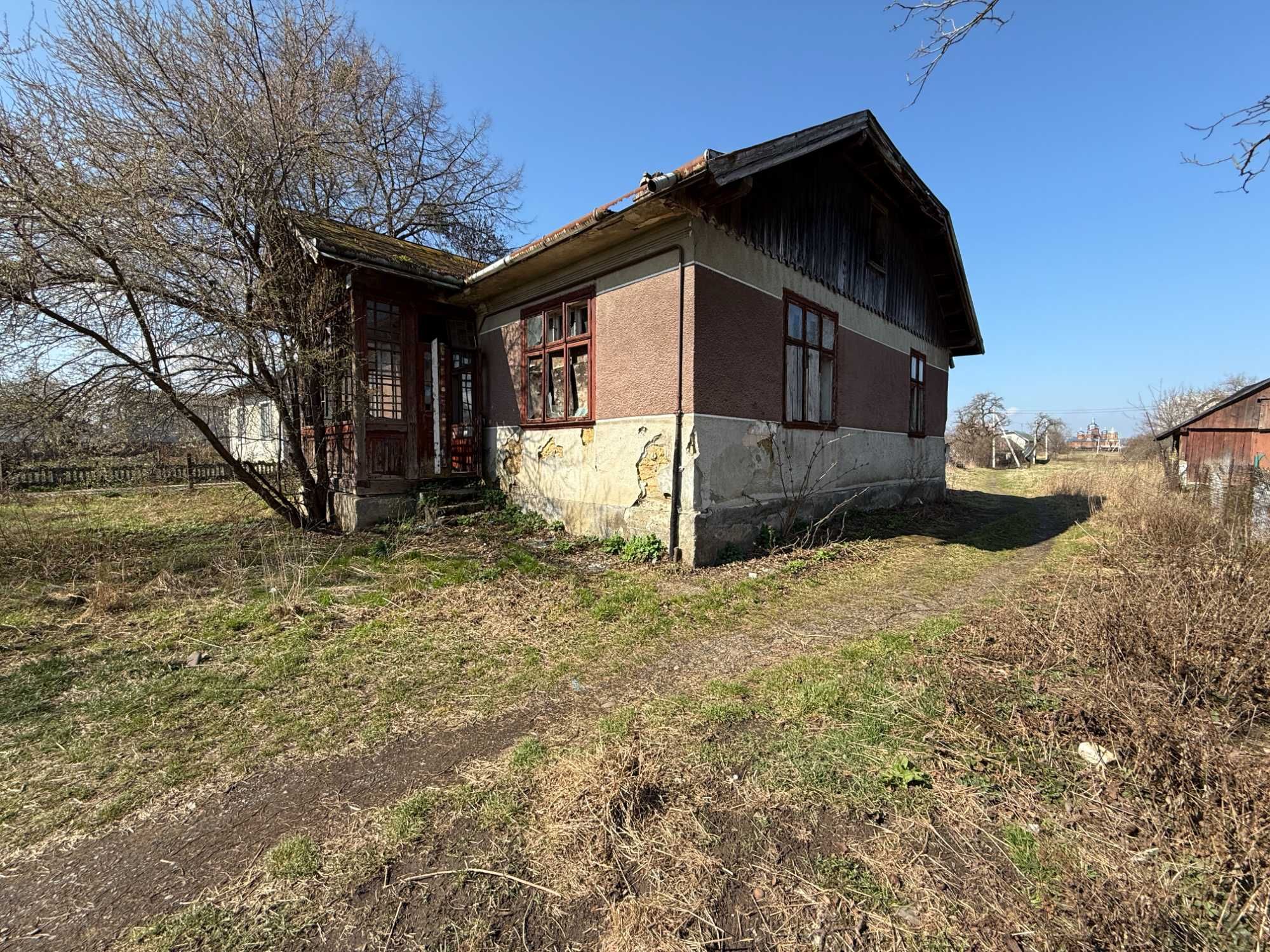 Ділянки 24 сот.землі та будинку  по вул. Шашкевича 150 у с. Дуліби