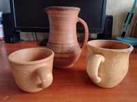 Глиняний глечик з чашками
