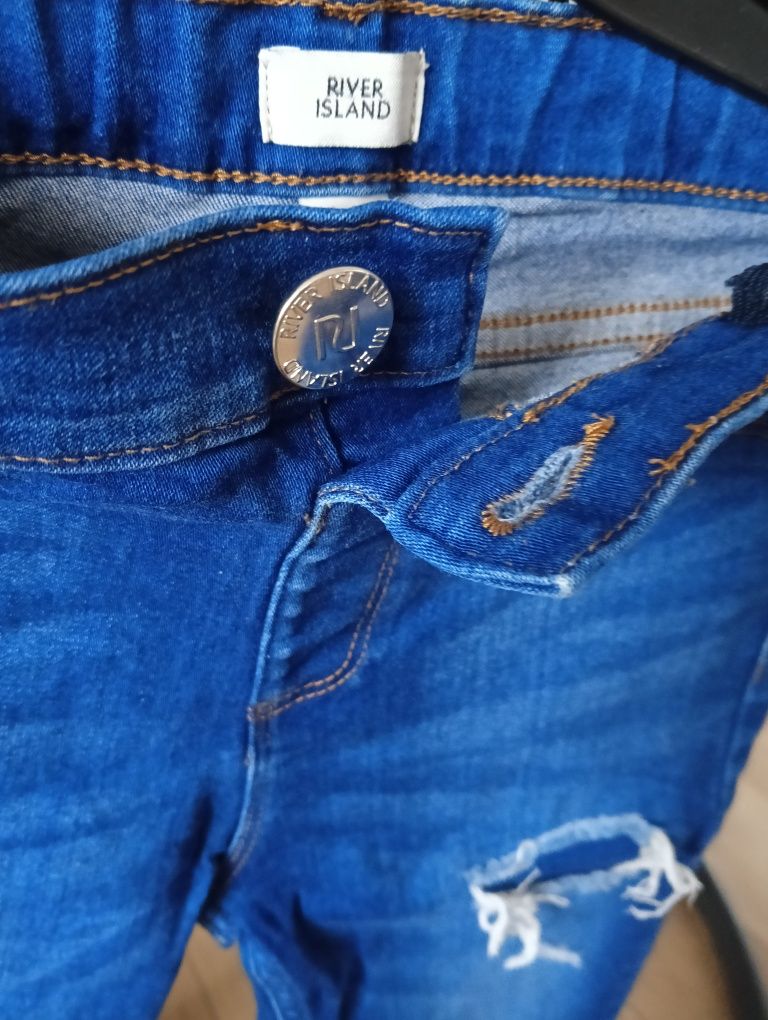 Spodnie River Island rurki miękki jeans z dziurami rozm. 134 9 lat