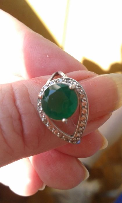 Серебряный комплект с изумрудом.
