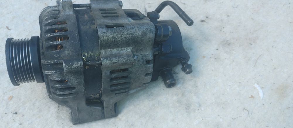 Alternator KIA CARENES 3