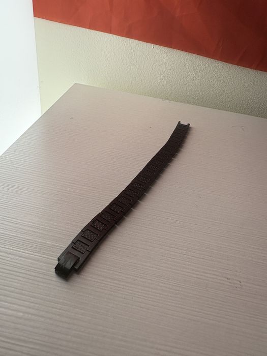 pulseira preta lacoste