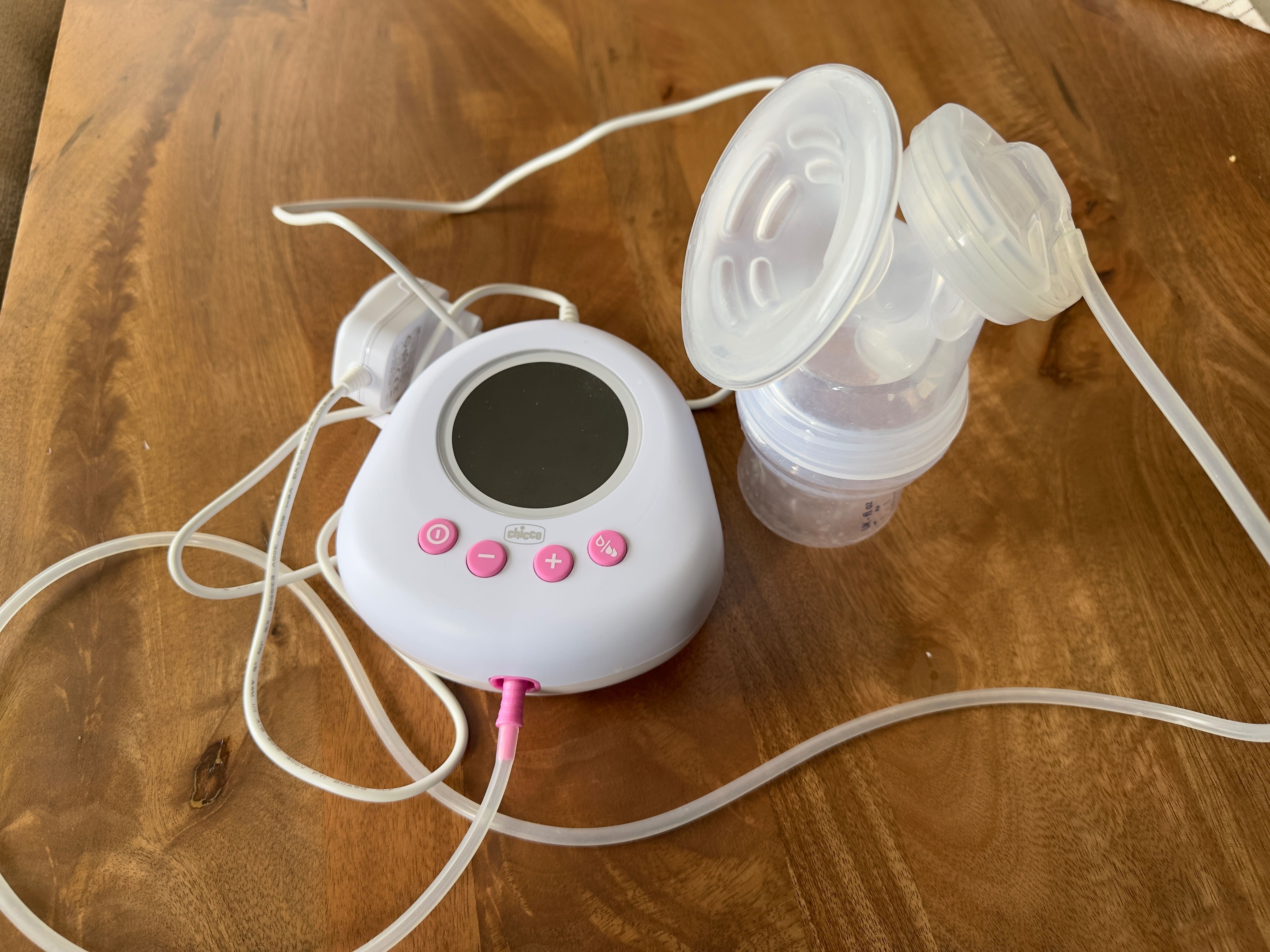 Bomba extratora de leite materno Chicco + copos de armazenamento