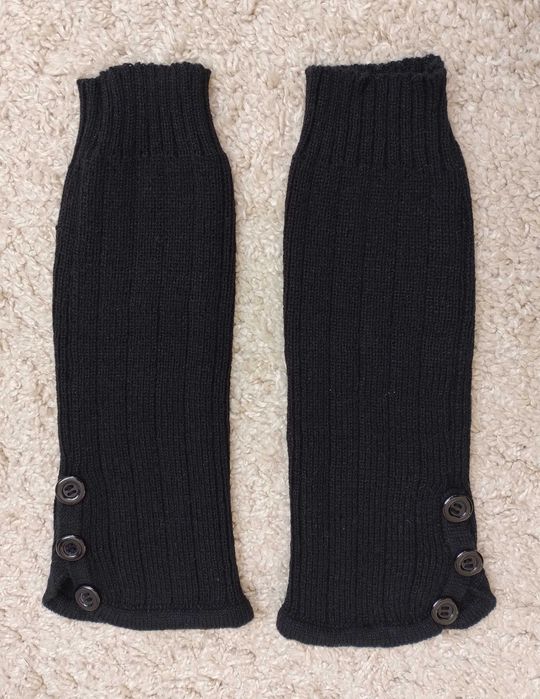 Nowe ocieplacze z guzikami na nogi, kolor Czarny.
