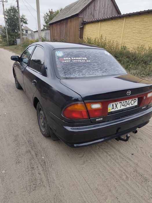 Mazda 323 1998 год