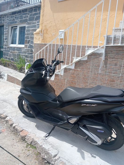 Vendo ou vendo uma  mota Honda 125