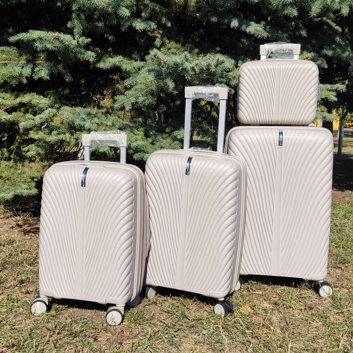 Валіза чемодан на 4 колеса поліпропілен Three birds M,S,XS