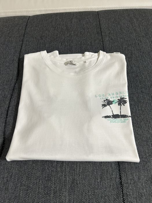 Koszulka biała z nadrukiem marki C&A rozmiar M - stan bardzo dobry