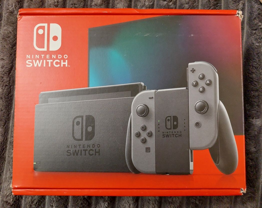 Nintendo Switch with gray Joy con