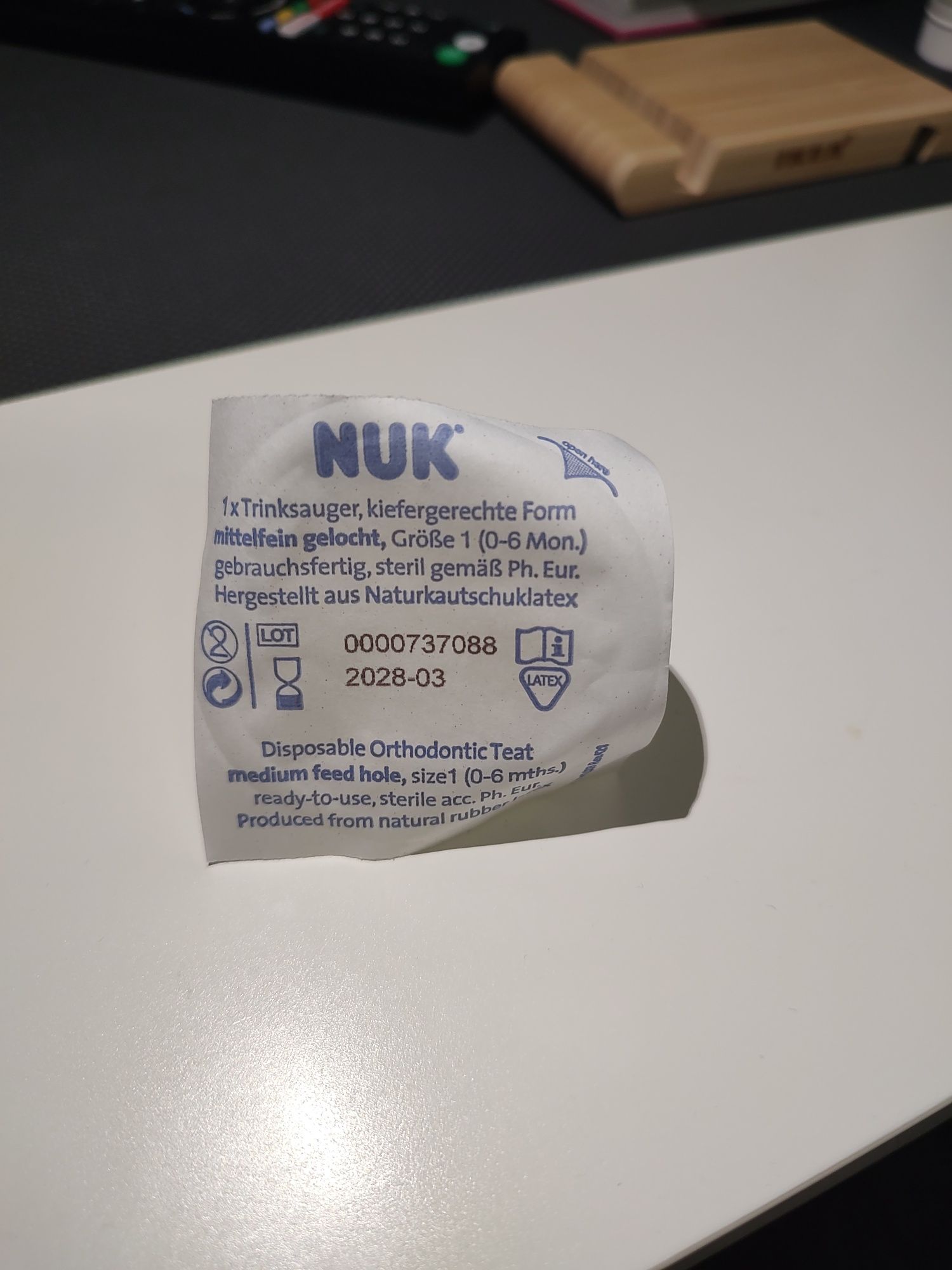 Jednorazowe smoczki lateksowe z nakrętką do butelki NUK roz 1 - 10 szt