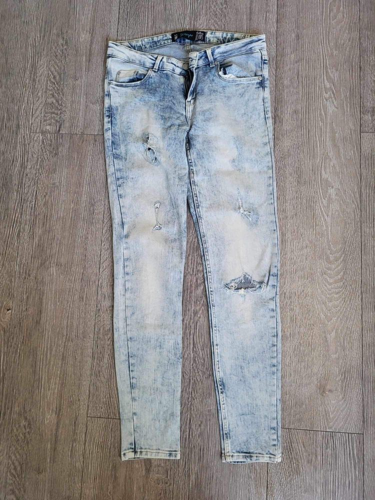 Spodnie damskie jeansowe z dziurami rozmiar S