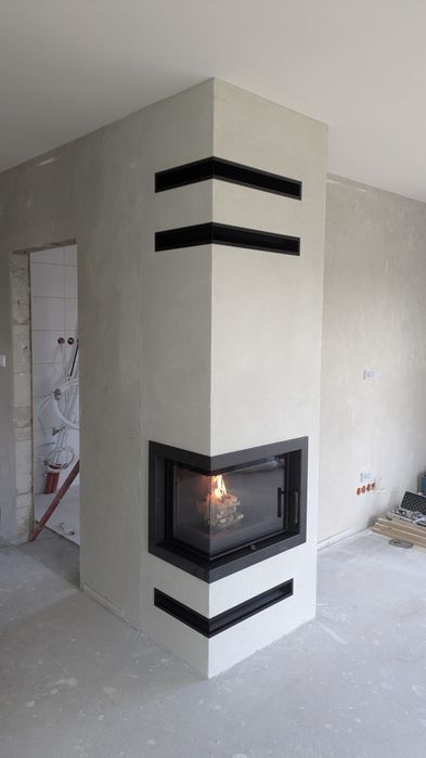 Nowoczesny kominek do rekuperacji z zabudową.