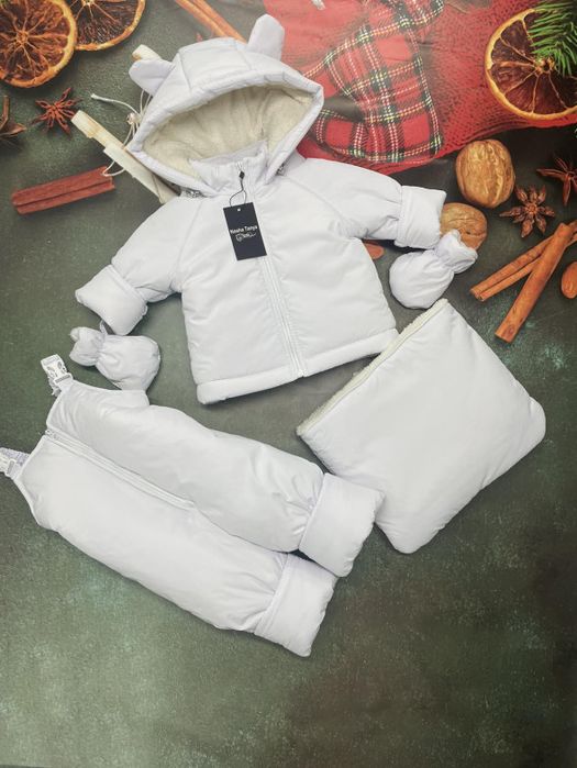 Зимові комбінезони