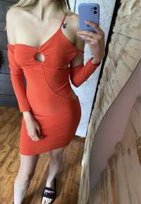 Sukienka pomarańczowa neonowa dopasowana mini z wycięciami