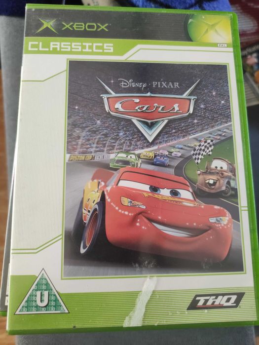 Vendo x box com dois comandos e 21 jogos.