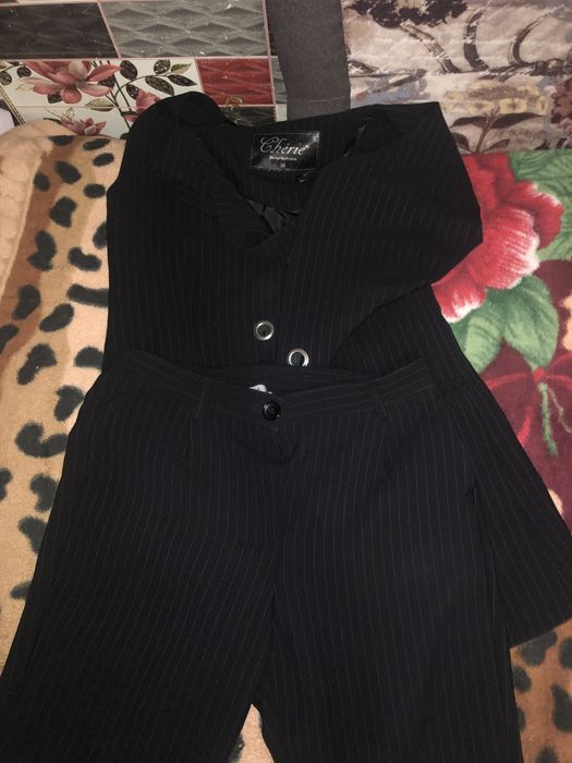 костюм S/M новий