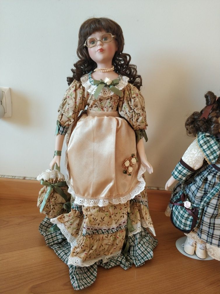 Bonecas de porcelana pintadas à mão