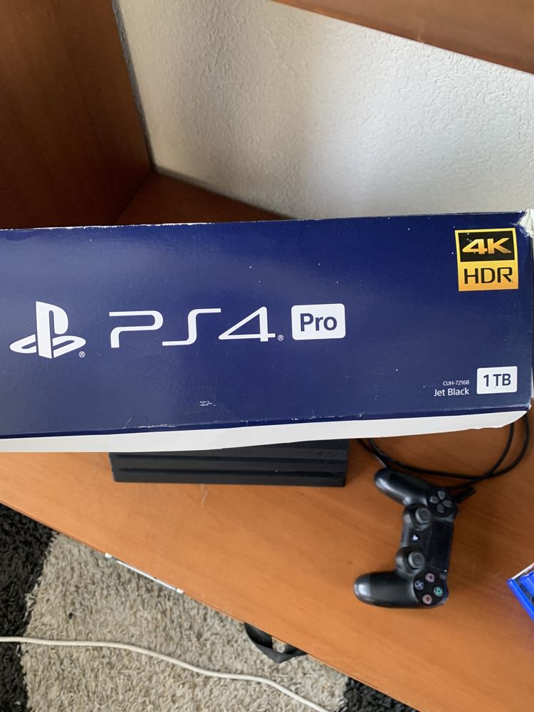 PlayStation 4 Pro Jet black 1Tb com 5 jogos e 2 comando