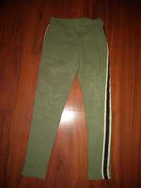 Zielone spodnie w paski cieplejsze r.146