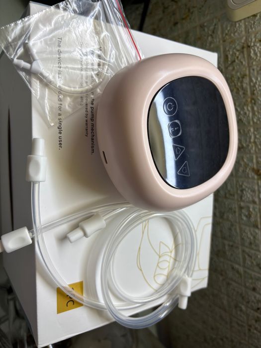 Молоковідсос вільні руки