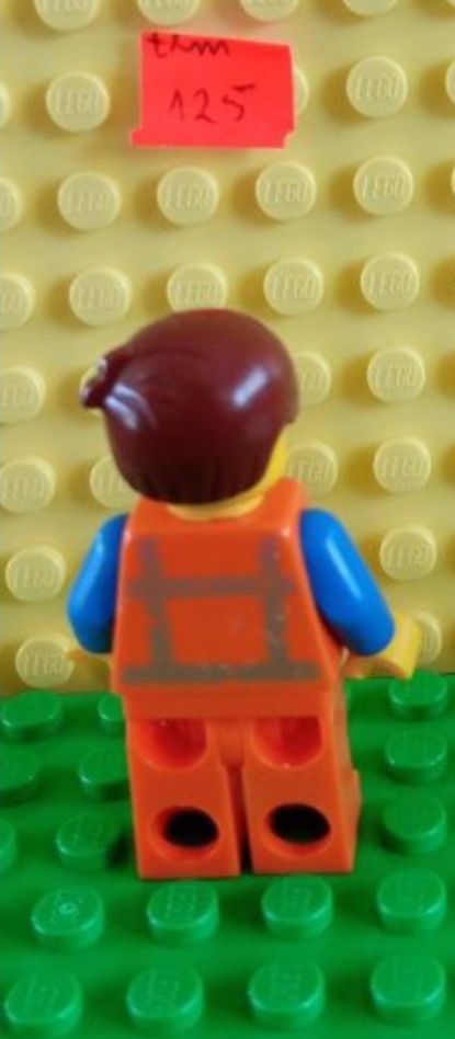 Lego mini figurka Emmet tlm125