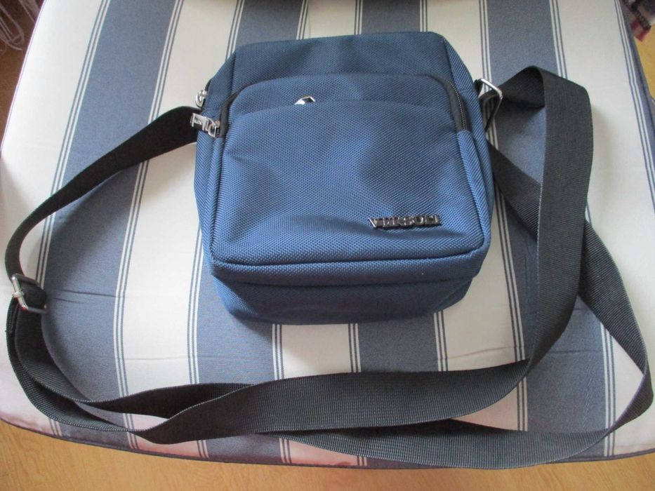 Męska niebieska saszetka