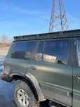 Скло в задні двері та заднє скло на Nissan Patrol GR Y61