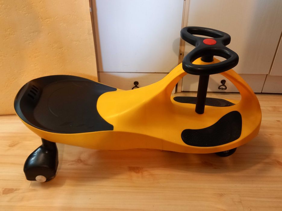 Jeździk grawitacyjny TWISTCAR Pojazd dla dzieci 3+ żółty stan bdb