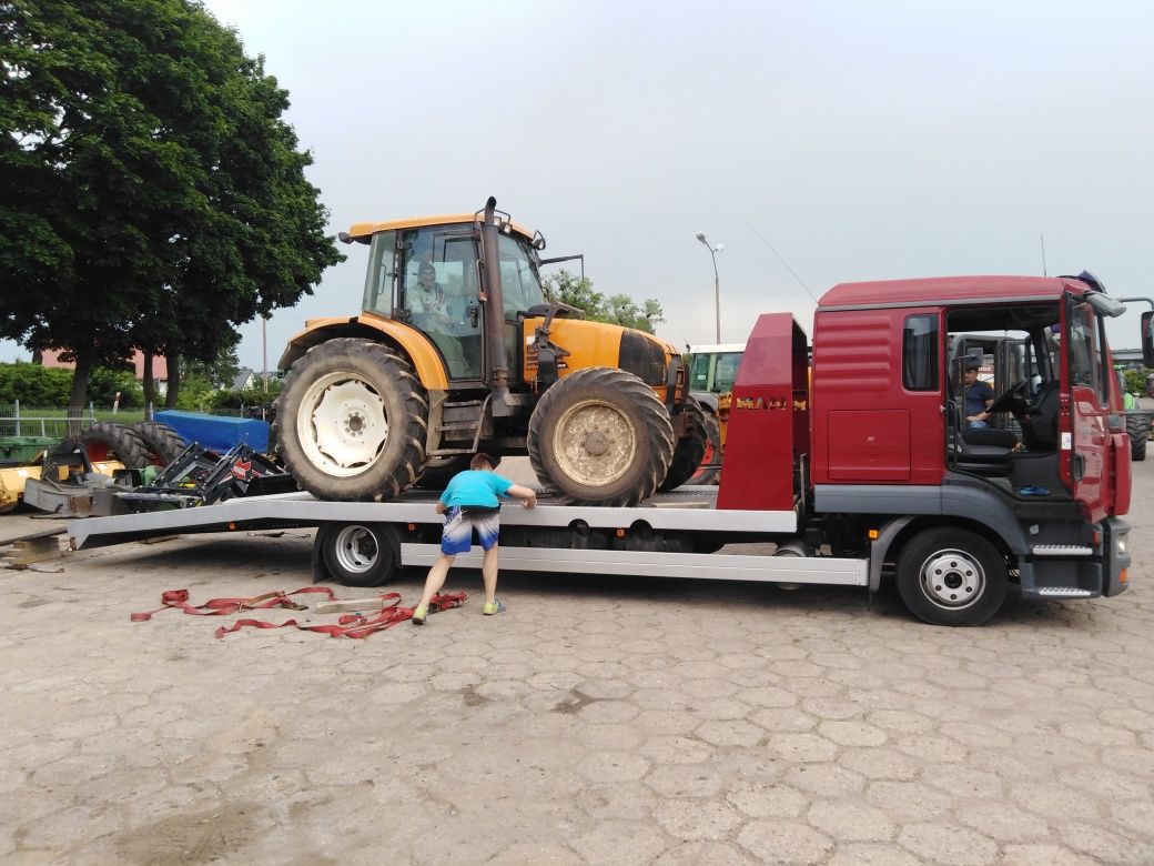 Uslugi transportowe aut laweta pomoc drogowa  przewóz maszyn  wynajem