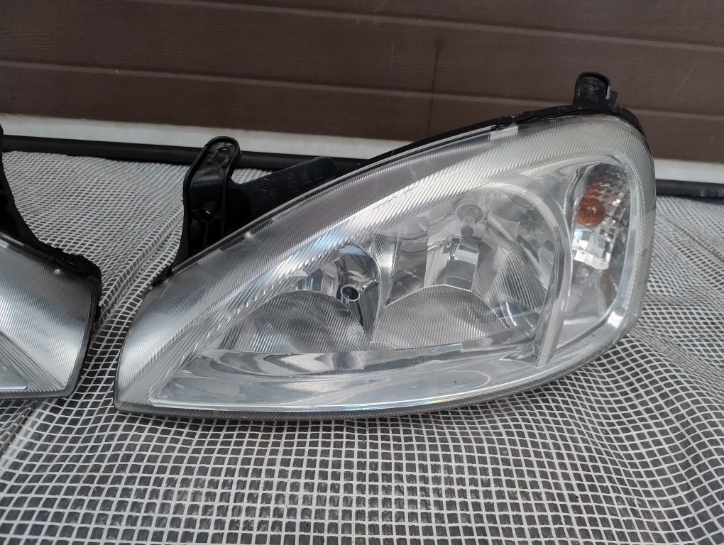 Opel Corsa c lift Europa lampa reflektor prawy lewy komplet DJ auto