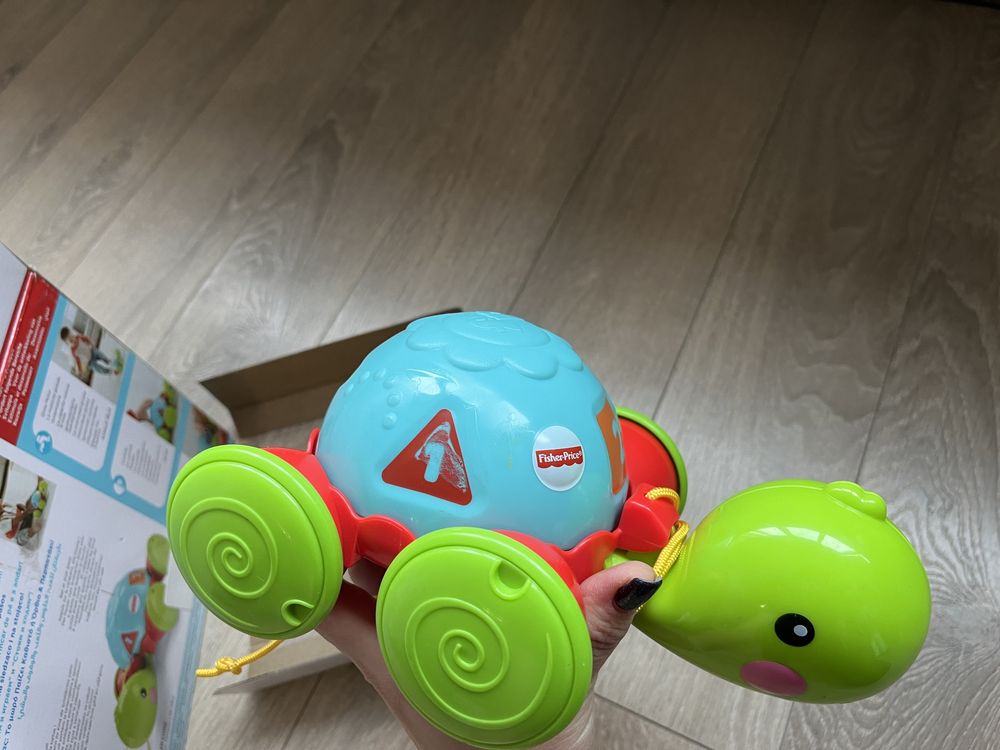 Черепаха каталка бренду Fisher Price