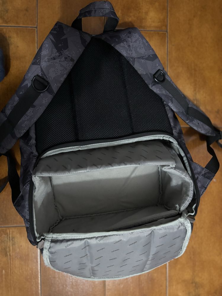 Mochila com compartimento para material fotografico
