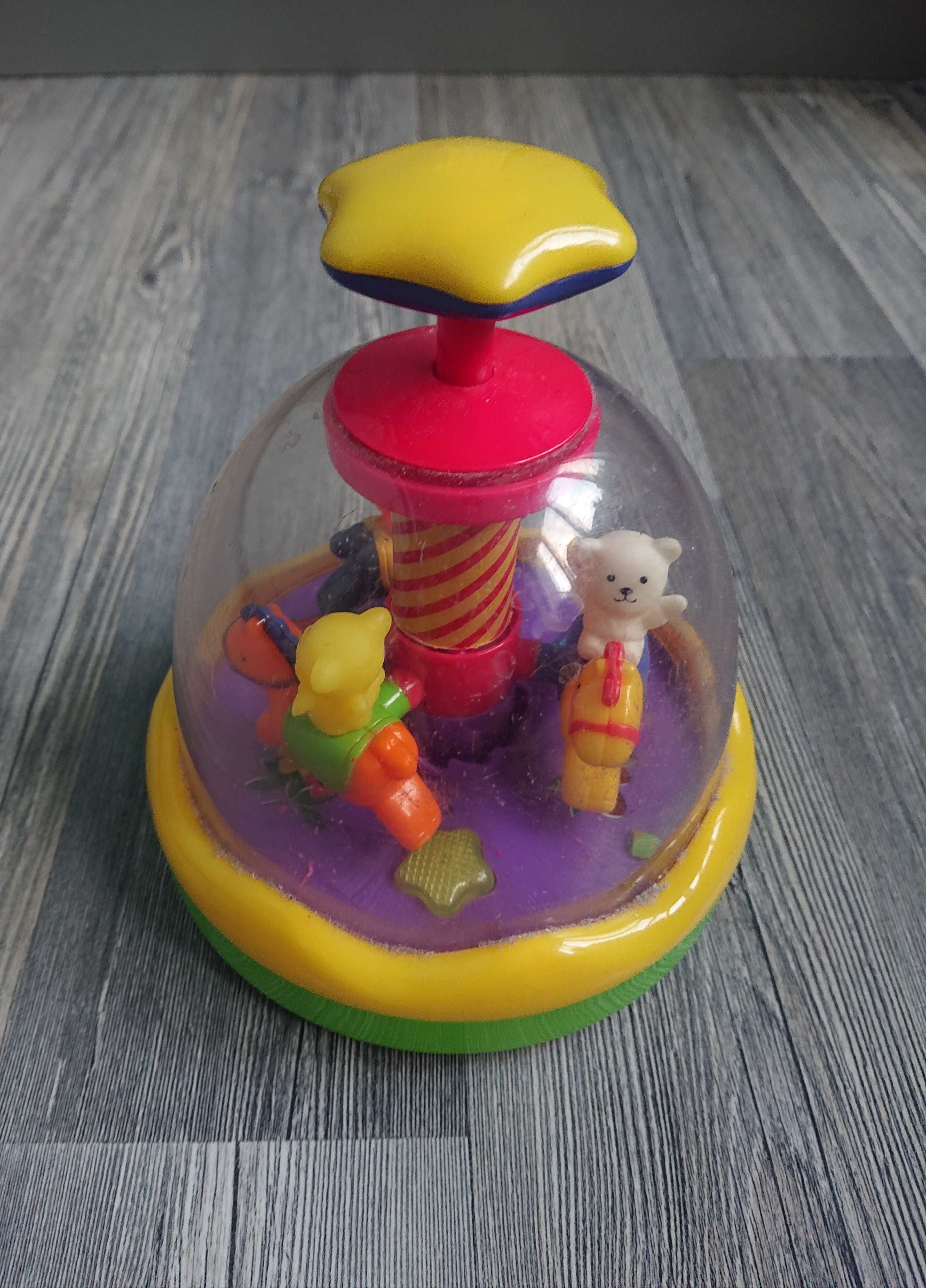 Юла игрушка карусель