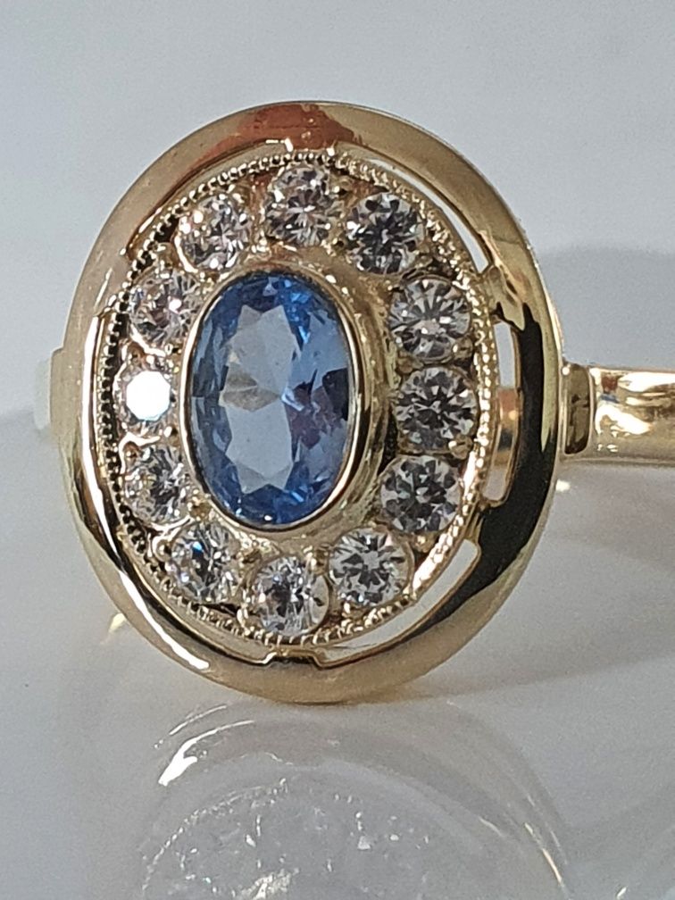 WŁOSKI atrakcyjny złoty pierścionek niebieskim oczkiem