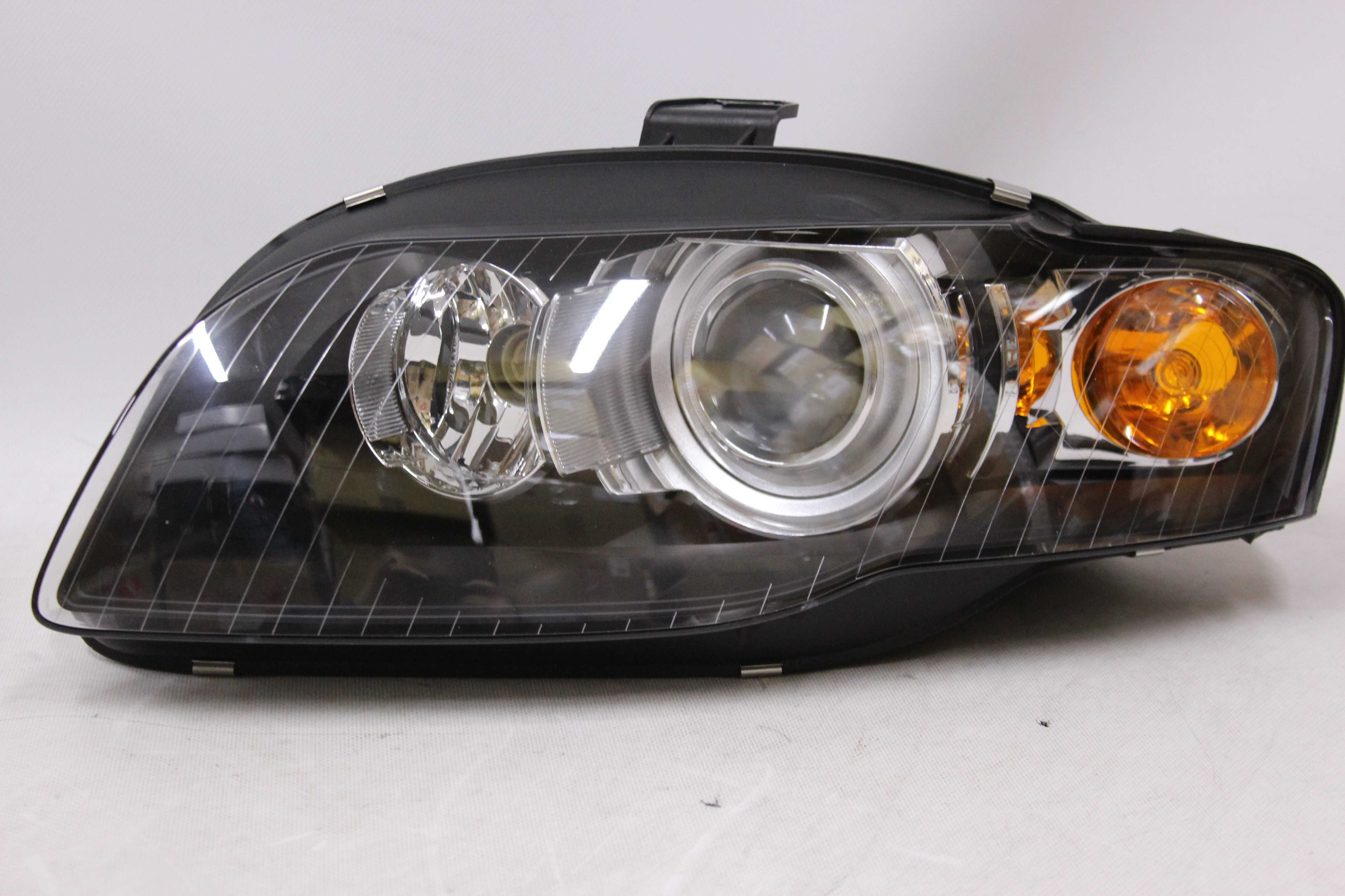 Lampy reflektory przednie przód AUDI A4 B7 04-08 XENON D1S SOCZEWKA !