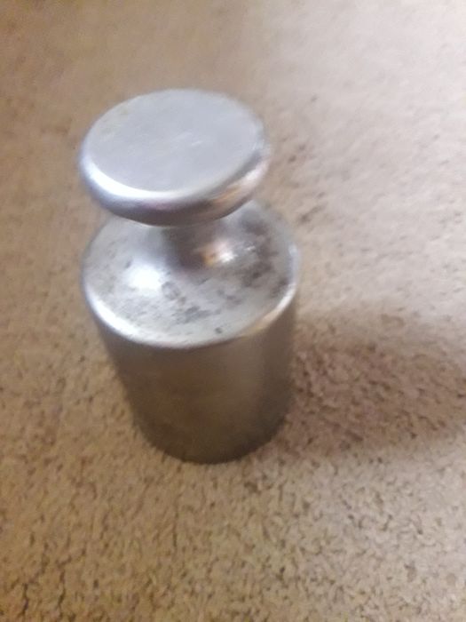 П'ятикілограмова торговельна гіря.