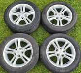 Felgi aluminiowe Toyota R16 5x114.3 z oponami letnimi