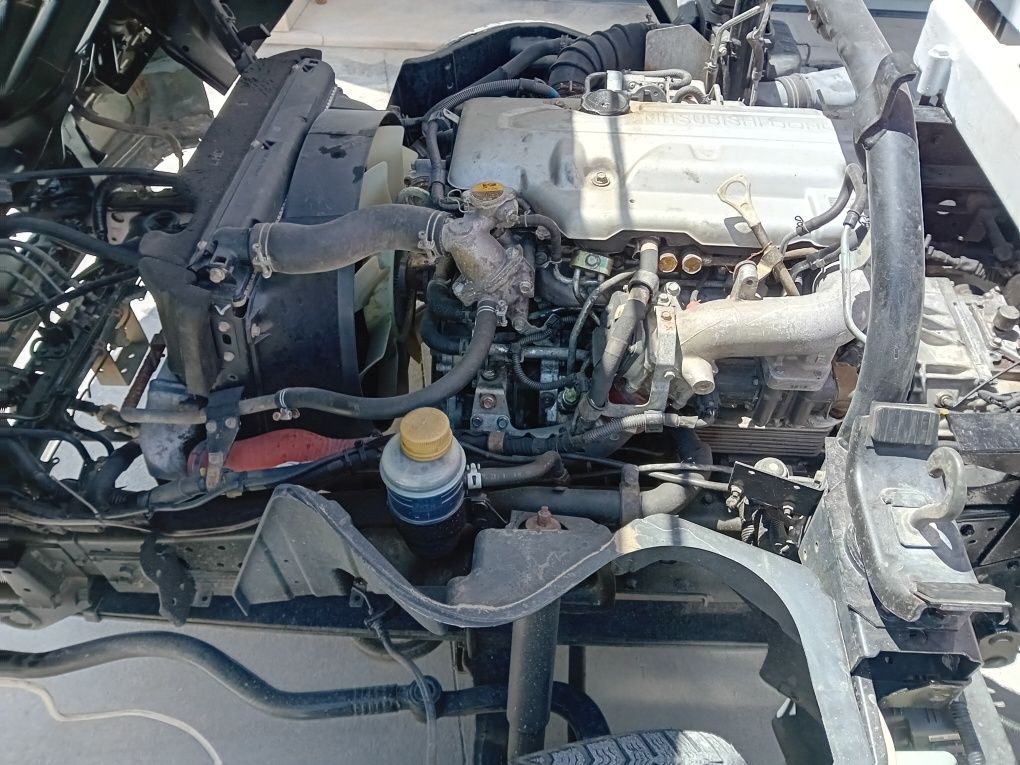 Mitsubishi Canter fuso 3c15com grua e bascula