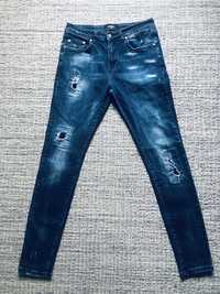 Represent England Repaired denim paint blue 32 spodnie jeansowe