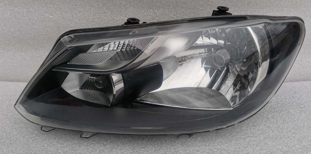 Фара левая Volkswagen Caddy Touran 2010-2015р.в. оригинал