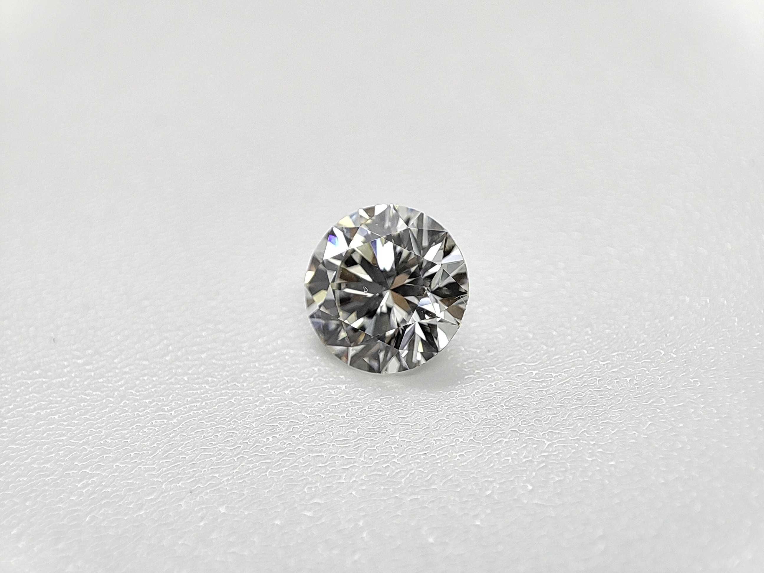 Brylant 0.55ct., H/VS2, ExExEx. GIA. Firma.