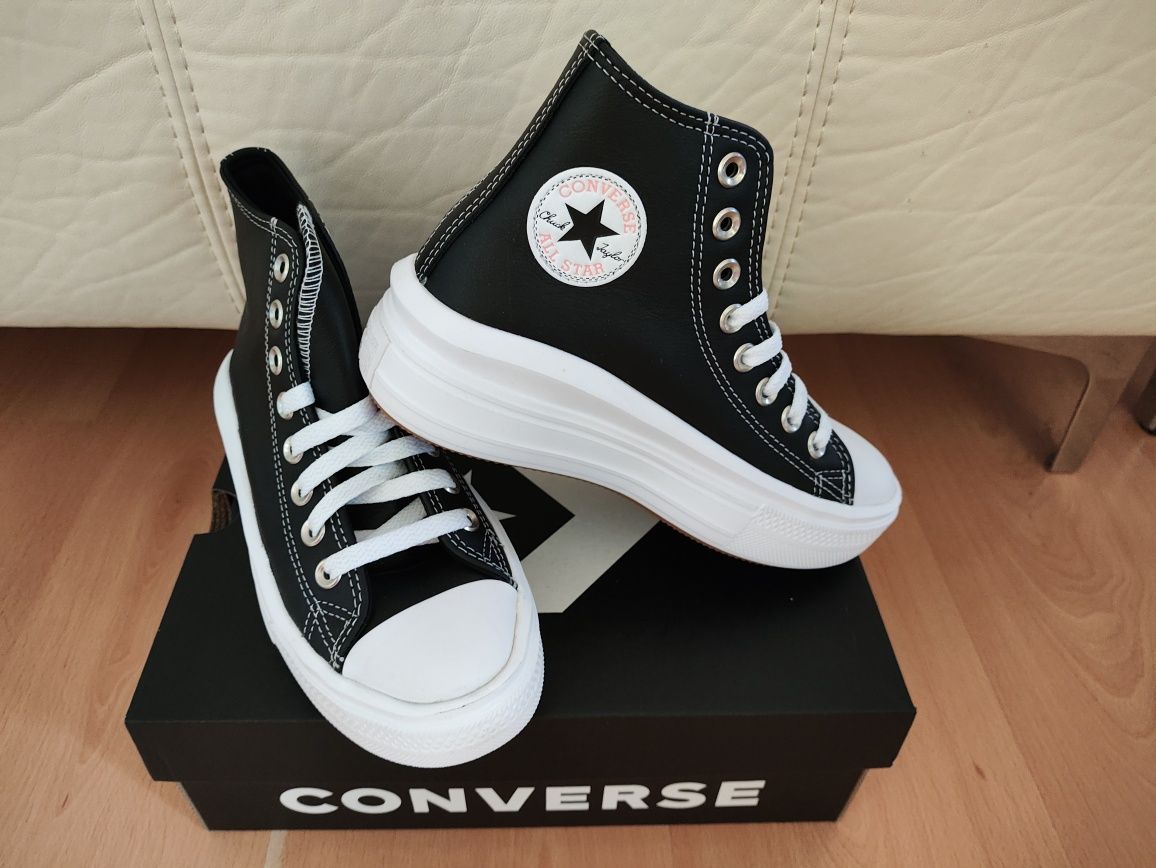 Sapatilhas Converse All Star em pele